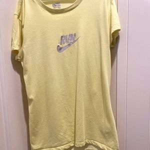 Light yellow Nike running shirt